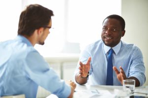 Two businessmen talking